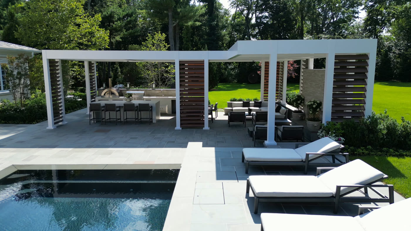 After: Motorized louvered pergola with IPE screens