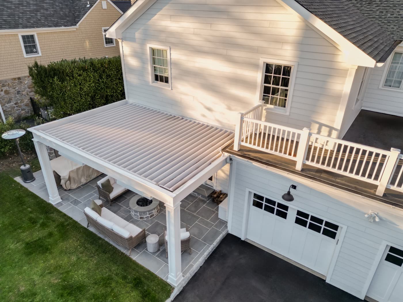 Aerial view of a louvered pergola in Manhasset, NY