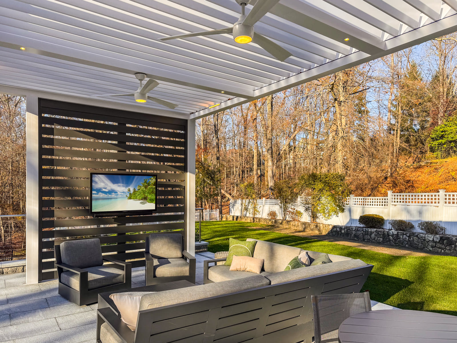 Motorized aluminum louvered pergola with concealed fasteners and integrated lighting