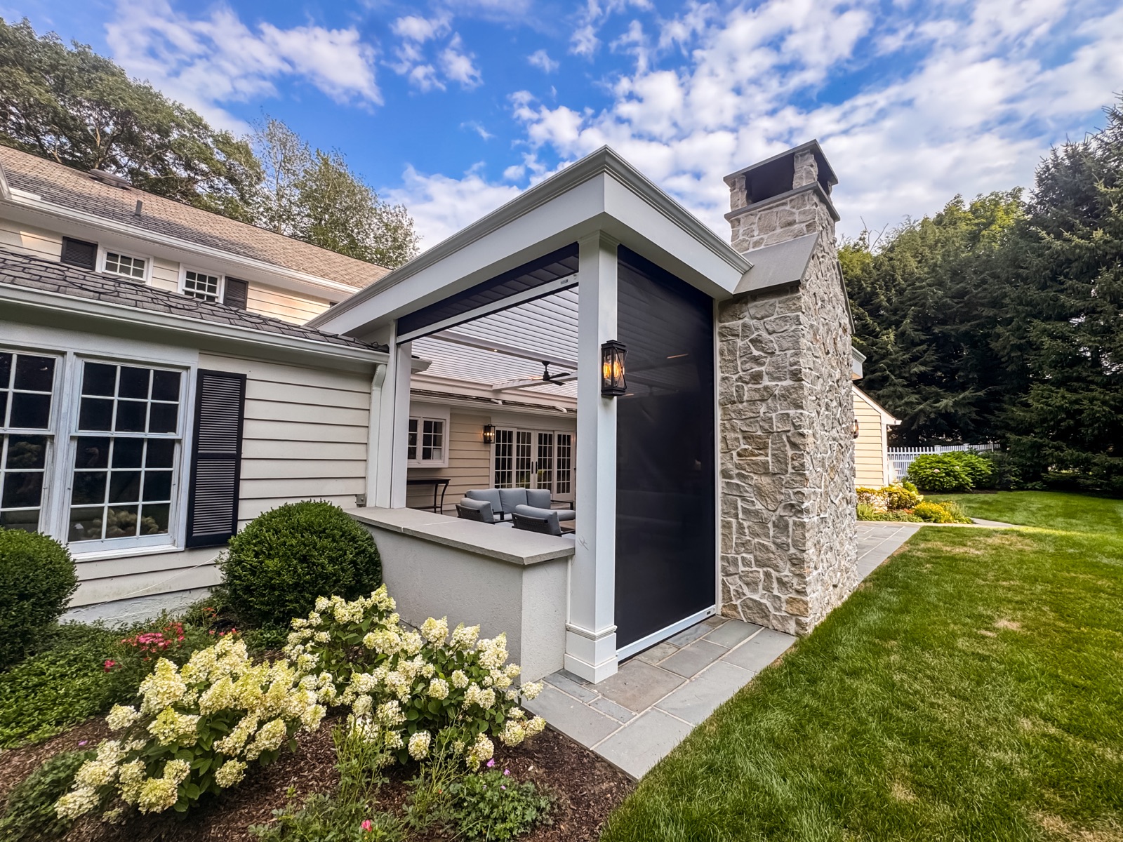 Armonk, NY motorized louvered roof — custom transitional trim