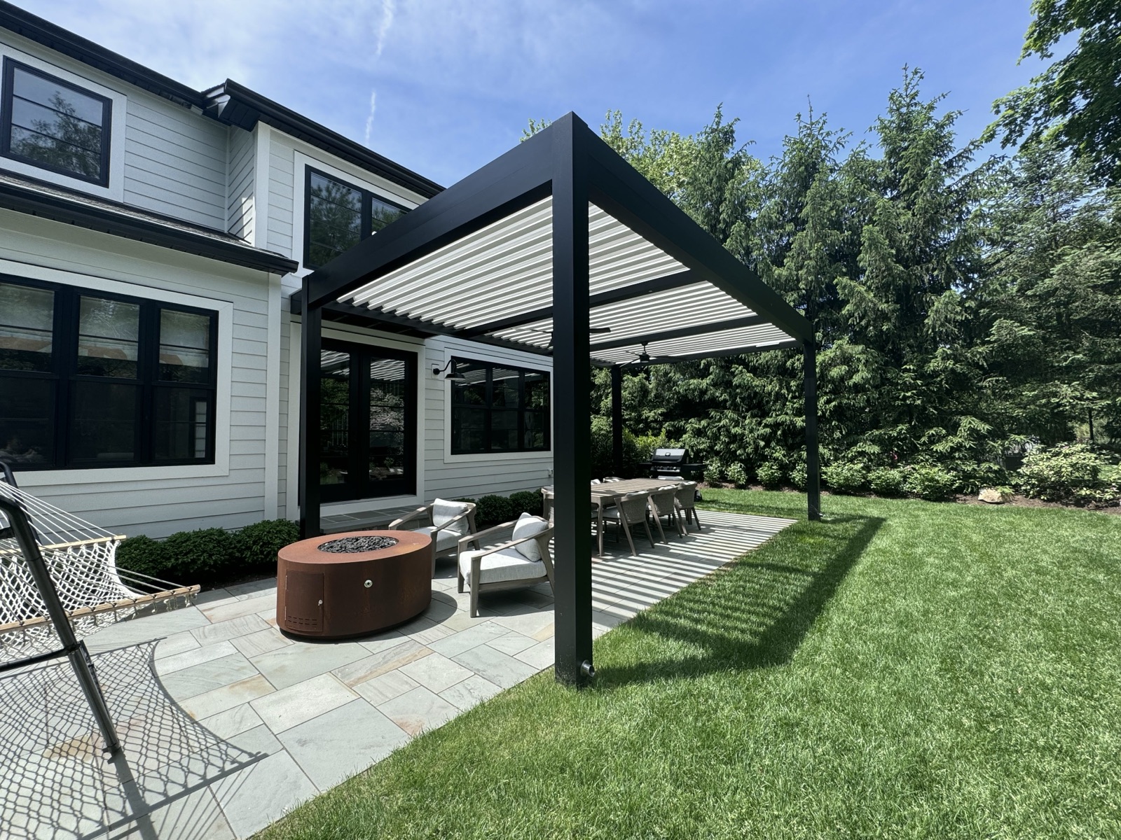 modern aluminum louvered roof — custom azek packout pergola in Demarest, NJ