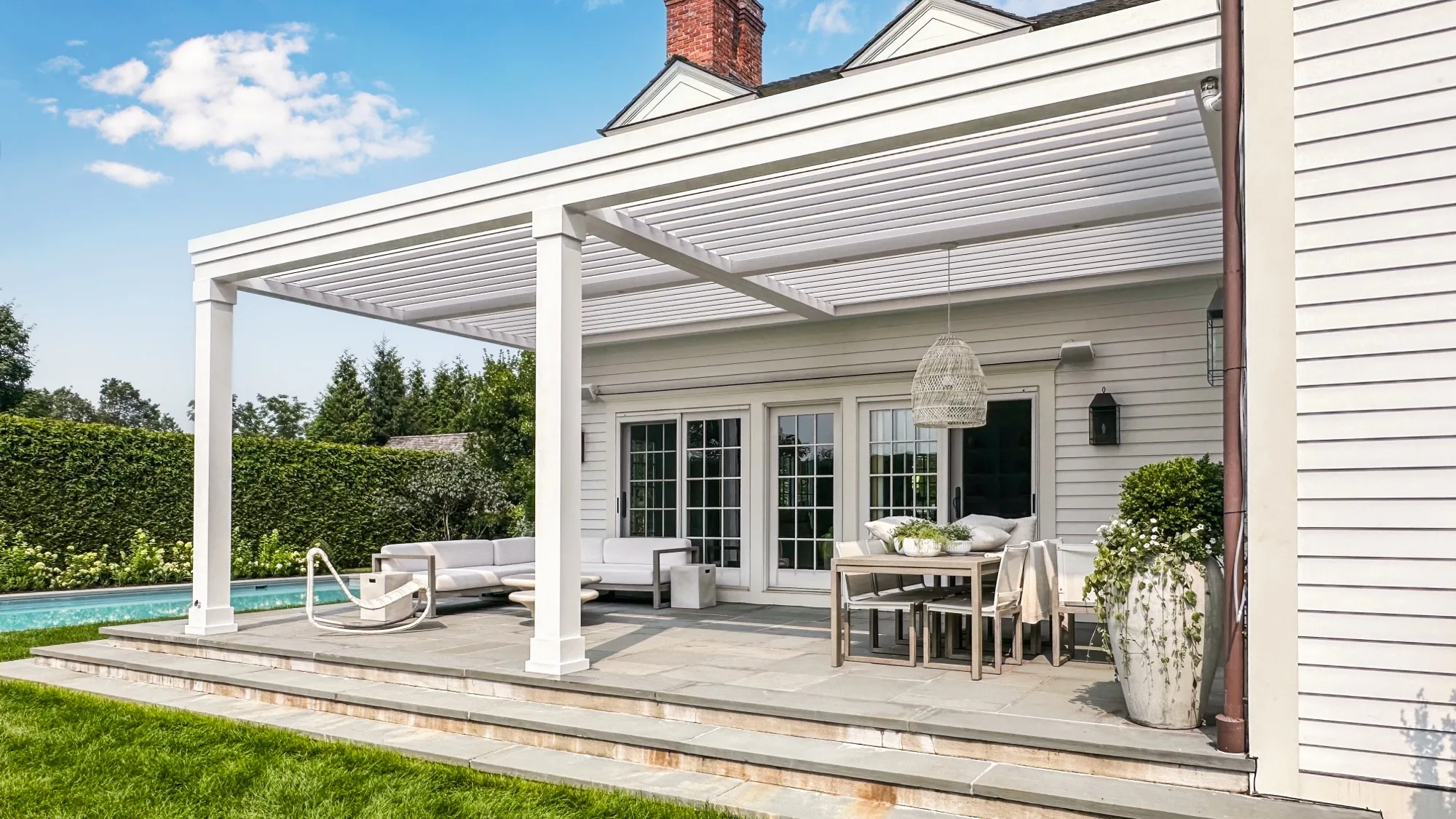 Transitional pergola with custom Azek wrapping