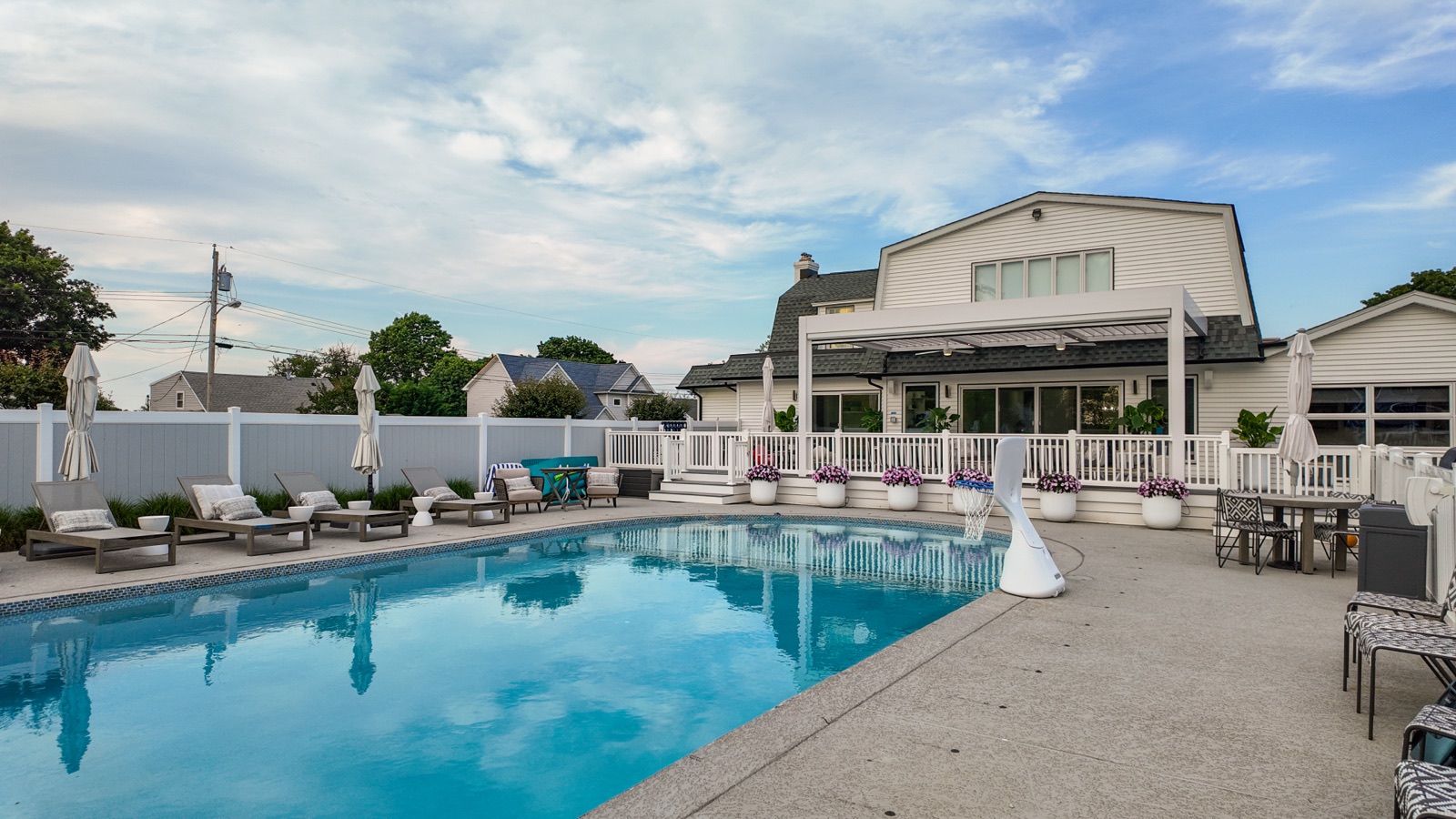 Long Branch, NJ modern poolside pergola — motorized retractable shade — detail view