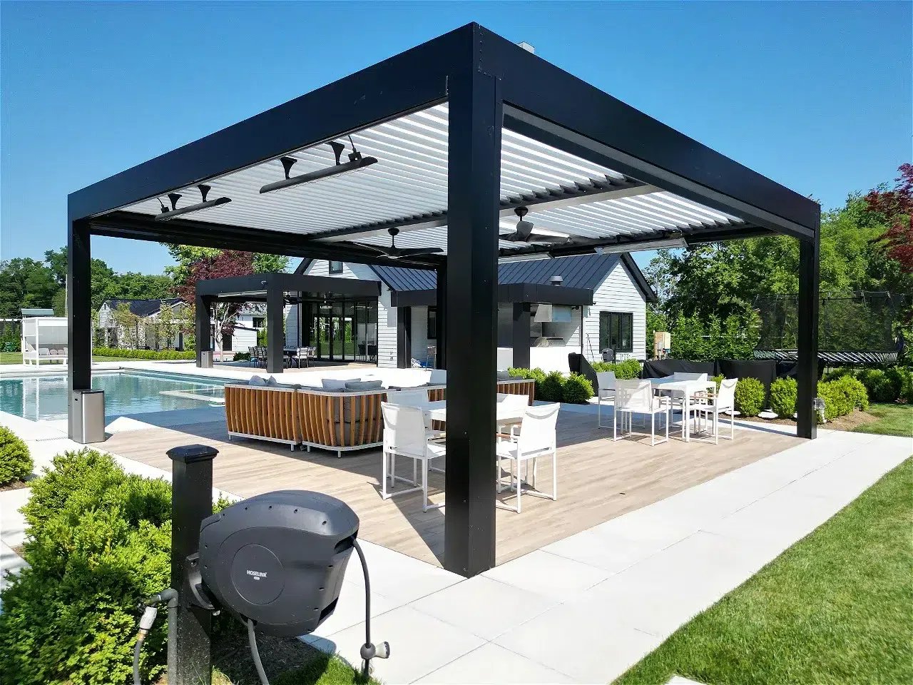 A Breslow louvered pergola project showing a motorized louvered roof over an outdoor living space