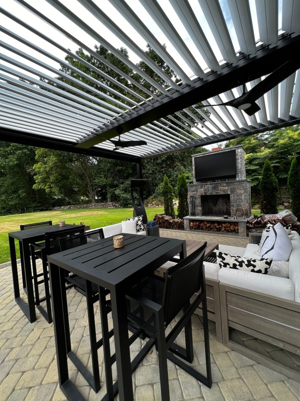 Breslow's Product Motorized-pergola-with-fireplace-tv-wall